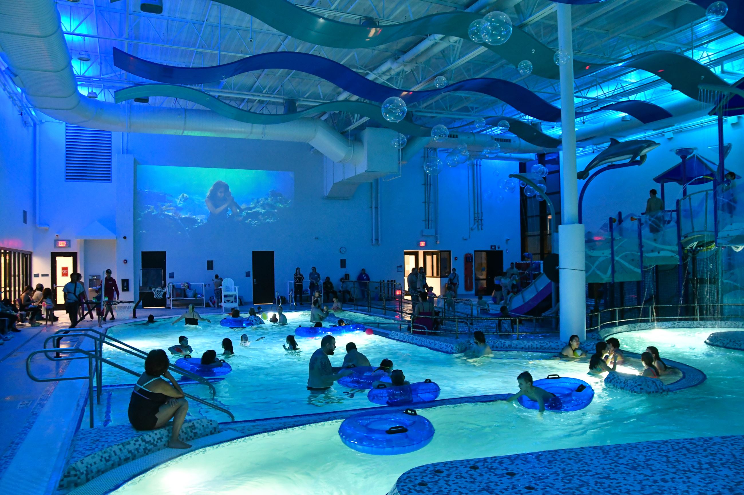 Photo inside the Romeoville Aquatic Center during a DIve In Movie
