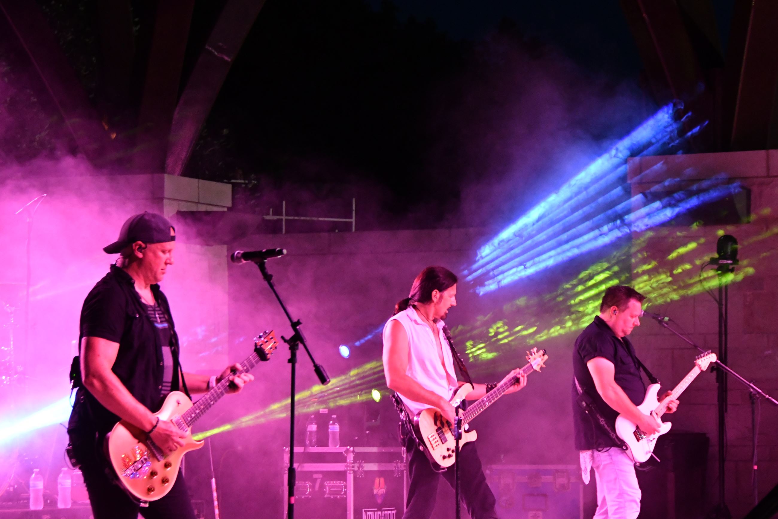 Musicians performing on the stage at Deer Crossing Park