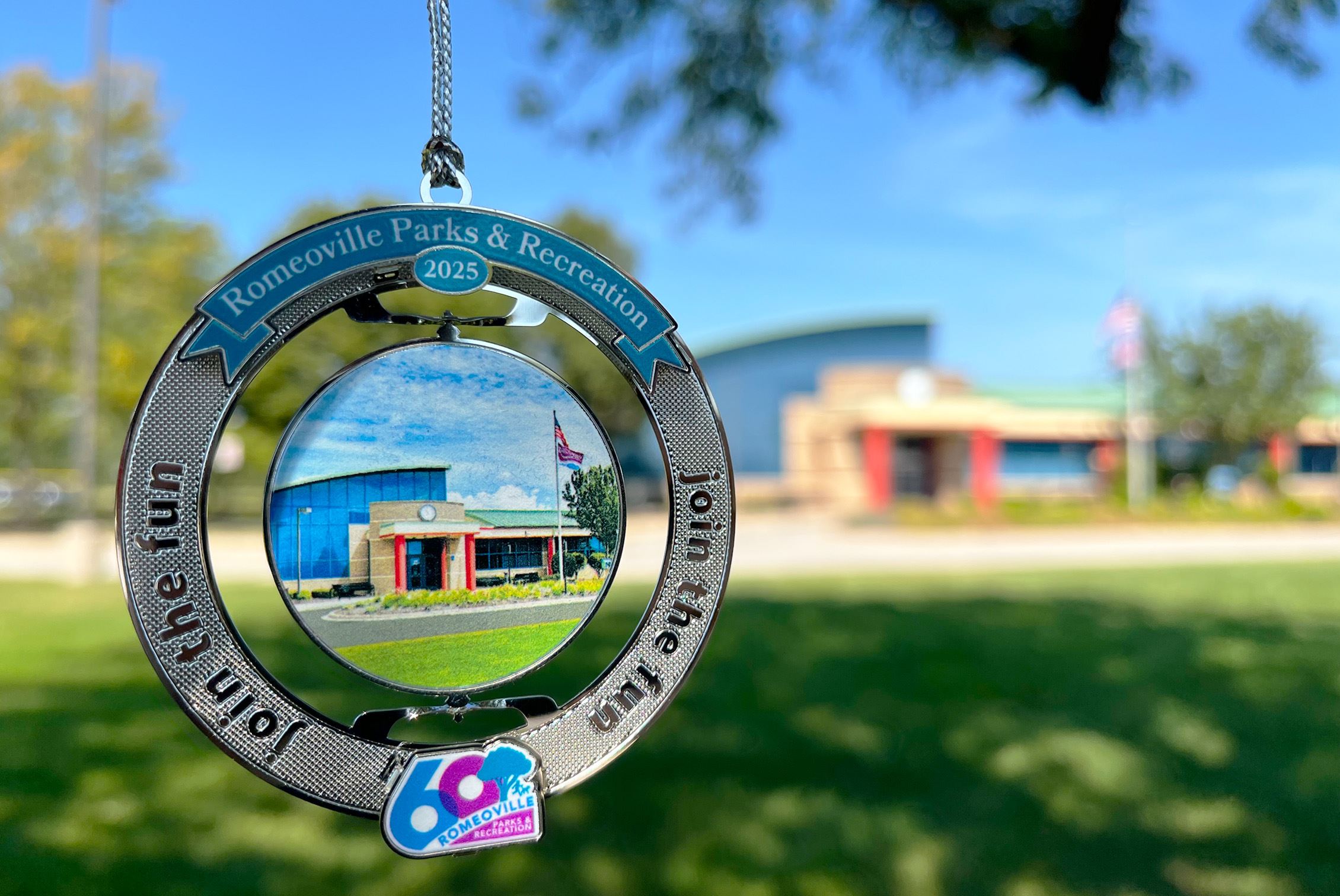 2025 ornament with the Recreation Center behind it.